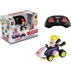 Carrera 370430036 CARRERA - 2.4GHz Mario Kart Mini RC - Peach Paperbox 1:50 RC model auta elektrický závodní auto, silniční model vč. akumulátorů a kabelu k